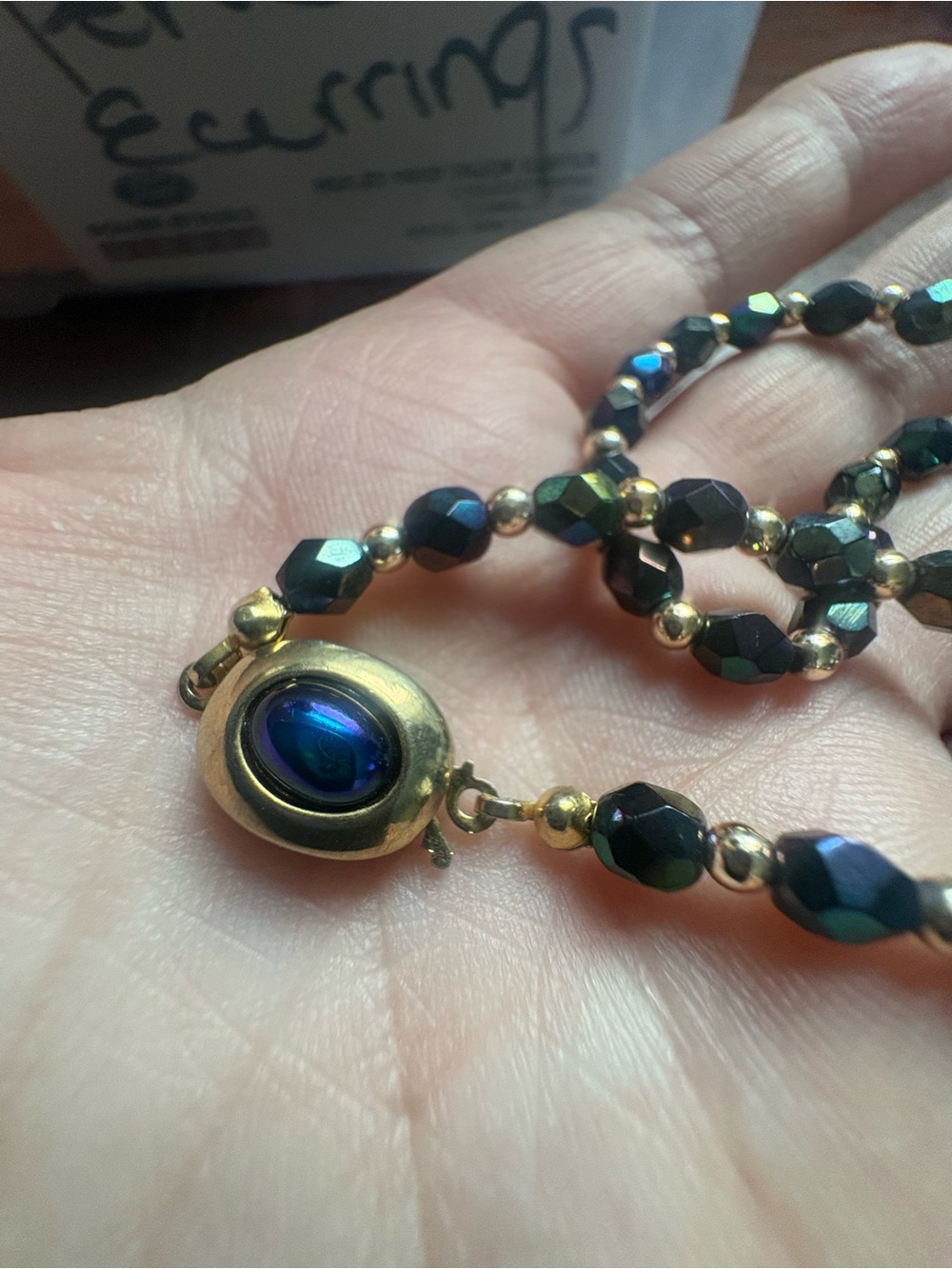 Elegant Women's Bead Necklace with Iridescent Blue Accent
